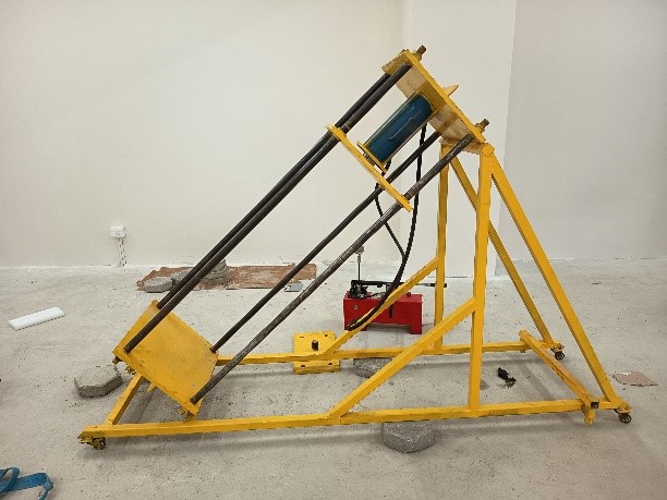 Reaction frame for diagonal compression (shear) testing of masonry wallets